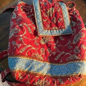 Red and Blue Quilted Backpack with Textured Design